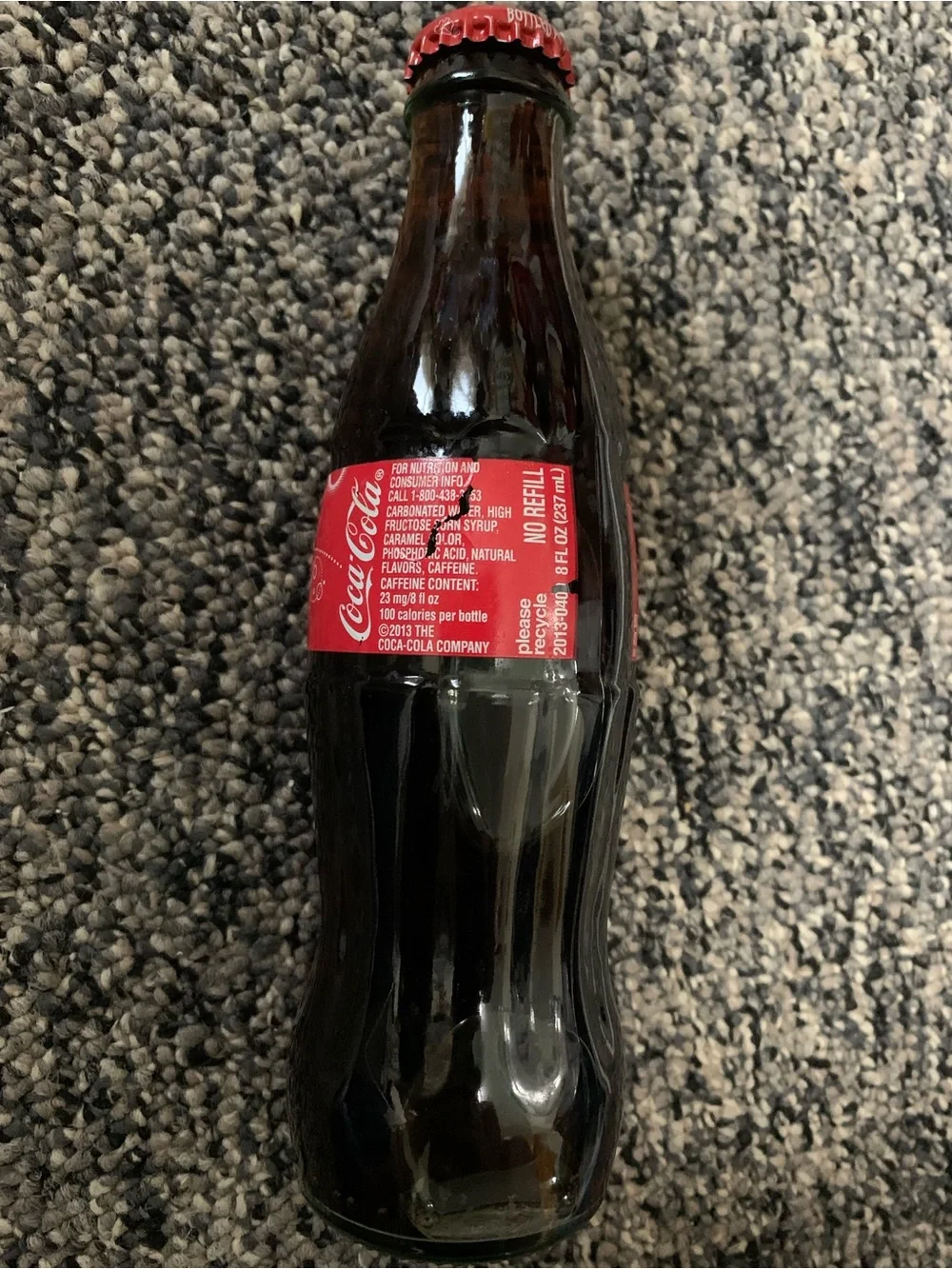 vintage Coca-Cola classic glass bottle bottled at the world of coca-cola in 2013
